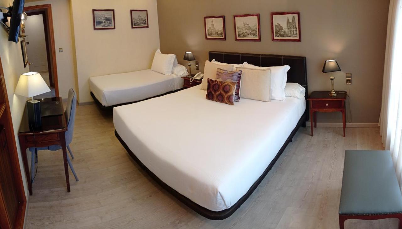 Camera Matrimoniale/Doppia con Letti Singoli con Letto Supplementare